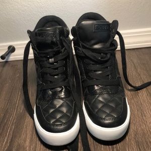 Guess. Women’s size 9.5 wedge tennis shoe. Black. Worn once